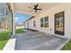 Back patio has a ceiling fan with views of the backyard at 2080 Cactus Ln, Cumming, GA 30040