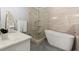 Modern bathroom featuring free-standing tub and glass shower at 2277 Peachtree Ne Rd # 302, Atlanta, GA 30309