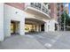 View of The Aramore entrance featuring a covered area for vehicles and access to the building at 2277 Peachtree Ne Rd # 302, Atlanta, GA 30309