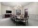 Formal dining room with a large table and stylish chandelier at 2277 Peachtree Ne Rd # 302, Atlanta, GA 30309