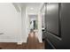 Inviting condo entryway with hardwood floors leading to an open living area at 2277 Peachtree Ne Rd # 302, Atlanta, GA 30309