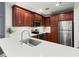 This kitchen has stainless appliances, updated cabinets and quartz countertops at 2277 Peachtree Ne Rd # 302, Atlanta, GA 30309
