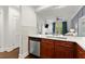 Contemporary kitchen features wood cabinets, stainless steel appliances, and quartz countertops at 2277 Peachtree Ne Rd # 302, Atlanta, GA 30309