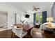 Bright living room boasts a dining area, balcony access, and an open floor plan at 2277 Peachtree Ne Rd # 302, Atlanta, GA 30309