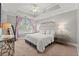 Bright bedroom featuring trey ceiling, neutral colors, and large window at 2277 Peachtree Ne Rd # 302, Atlanta, GA 30309