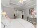 Bright bedroom featuring trey ceiling, neutral colors, and ensuite bath at 2277 Peachtree Ne Rd # 302, Atlanta, GA 30309