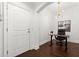 Office area with hard wood floors with a view into the hall of the home at 2277 Peachtree Ne Rd # 302, Atlanta, GA 30309