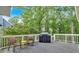 Relax on this spacious back deck, complete with a grill and seating for outdoor enjoyment at 5804 Fairwood Nw Cir, Acworth, GA 30101