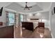 Tranquil main bedroom suite with tray ceilings, hardwood floors and plenty of natural light at 5804 Fairwood Nw Cir, Acworth, GA 30101