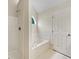 Bright bathroom with shower and large tub, the perfect place to relax and unwind at 1792 Portwest Way, Hampton, GA 30228