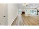 Spacious living room showcasing new floors, fireplace, and access to the backyard at 1792 Portwest Way, Hampton, GA 30228