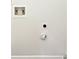 Interior utility hookups for washer and dryer in laundry area at 1792 Portwest Way, Hampton, GA 30228