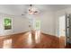 Spacious main bedroom featuring hardwood floors, vaulted ceiling, and natural light at 1980 Heatherton Rd, Dacula, GA 30019