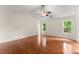 Spacious main bedroom featuring hardwood floors, vaulted ceiling, and large windows at 1980 Heatherton Rd, Dacula, GA 30019