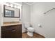 Bright bathroom with updated vanity, granite counters, and a neutral color scheme at 11260 Havenwood Dr, Johns Creek, GA 30097