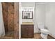 Bathroom features a tile shower, granite vanity, and updated fixtures at 11260 Havenwood Dr, Johns Creek, GA 30097