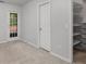 Bedroom with closet and glass door that leads to the outside at 1529 Liberty Nw Pkwy, Atlanta, GA 30318