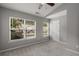 Bright bedroom features large windows and plush carpet at 1529 Liberty Nw Pkwy, Atlanta, GA 30318
