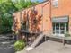 Exterior of brick building with multiple entrances, awnings, and visible signage for different businesses at 1529 Liberty Nw Pkwy, Atlanta, GA 30318
