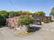 Brick building exterior with parking, signage, and mature landscaping, presenting a professional and inviting appearance at 1529 Liberty Nw Pkwy, Atlanta, GA 30318