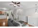 Open concept living area with hardwood floors flowing into the kitchen at 1529 Liberty Nw Pkwy, Atlanta, GA 30318