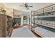 Bright bedroom with a bunk bed, hardwood floors, and a window with a view of the front yard at 2904 Masonwood Nw Dr, Kennesaw, GA 30152