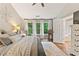 Relaxing main bedroom with natural light, hardwood floors, and an en-suite bathroom at 2904 Masonwood Nw Dr, Kennesaw, GA 30152