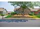 Charming stone and brick townhome featuring a well-maintained lawn and landscaping at 4347 Lanier Ridge Walk # 1501, Cumming, GA 30041
