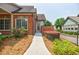 Beautiful brick home with a welcoming front entrance and manicured landscaping at 4347 Lanier Ridge Walk # 1501, Cumming, GA 30041