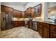 Gourmet kitchen featuring stainless appliances and custom cabinetry at 4347 Lanier Ridge Walk # 1501, Cumming, GA 30041