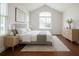 Bedroom with vaulted ceilings, neutral decor, and large windows at 4347 Lanier Ridge Walk # 1501, Cumming, GA 30041