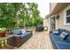 Inviting outdoor deck featuring comfortable seating and a grill, perfect for entertaining or relaxing at 4497 Windsor Oaks Dr, Marietta, GA 30066