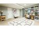 Functional office space featuring a large built-in bookcase and stylish decor elements at 4497 Windsor Oaks Dr, Marietta, GA 30066