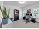 Well-lit home office with a modern desk setup, comfortable seating, and ample storage for a productive workspace at 1099 Heyward Way, Alpharetta, GA 30009