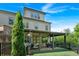 Charming two-story home featuring a covered patio and beautifully landscaped backyard at 1099 Heyward Way, Alpharetta, GA 30009