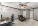 Bedroom with a ceiling fan, carpet floors, and a comfortable recliner chair at 1770 Rockland Se Dr, Atlanta, GA 30316