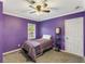 Bedroom with purple walls, carpet floors, and a twin-sized bed at 1770 Rockland Se Dr, Atlanta, GA 30316