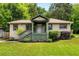 Charming one-story home with a well-manicured lawn and inviting front porch at 1770 Rockland Se Dr, Atlanta, GA 30316