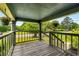 Cozy front porch with hanging plants and wood flooring offering a relaxing outdoor space with neighborhood views at 1770 Rockland Se Dr, Atlanta, GA 30316