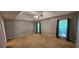 Primary bedroom with carpet floors, ceiling fan, and natural light at 2123 Condor Dr, Lawrenceville, GA 30044