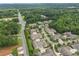 The aerial view highlights the neighborhood's verdant trees, landscaping, and sidewalks at 2384 Tree Arbor Way, Marietta, GA 30064