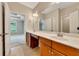Bathroom boasts double sinks with attractive faucets and access to the main bedroom at 2384 Tree Arbor Way, Marietta, GA 30064