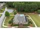 This aerial image displays the clubhouse with pool access and verdant landscaping at 2384 Tree Arbor Way, Marietta, GA 30064