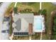 An aerial view features a refreshing community pool with lounge chairs and nearby trees at 2384 Tree Arbor Way, Marietta, GA 30064