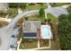 This aerial showcases a refreshing community pool, lounge chairs, and lush landscaping at 2384 Tree Arbor Way, Marietta, GA 30064