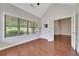 Bright sun room with vaulted ceilings, hardwood floors, and large windows with natural light at 2384 Tree Arbor Way, Marietta, GA 30064