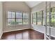 Sun-filled sun room with hardwood floors and large windows offering great natural light at 2384 Tree Arbor Way, Marietta, GA 30064