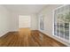 Bright and airy living room with hardwood floors, neutral walls, and large windows at 840 Hickory Sw Dr, Marietta, GA 30064