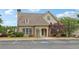 Charming clubhouse featuring stone accents, ample parking, and manicured landscaping enhancing community appeal at 3325 Castleberry Village Cir, Cumming, GA 30040