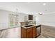 Open kitchen and living area featuring granite countertops and stainless steel appliances at 3325 Castleberry Village Cir, Cumming, GA 30040